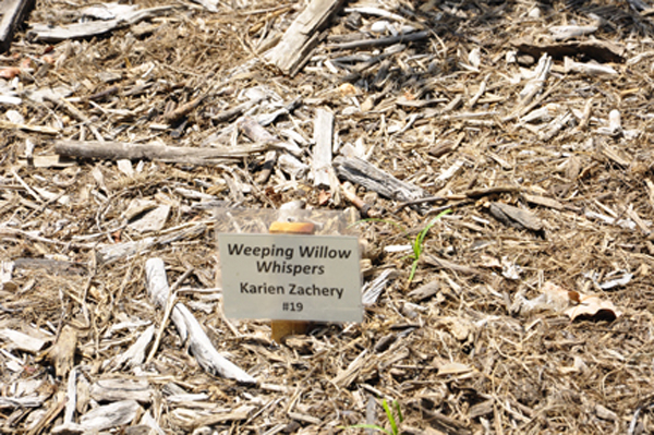 Weeping Willow Whispers sign