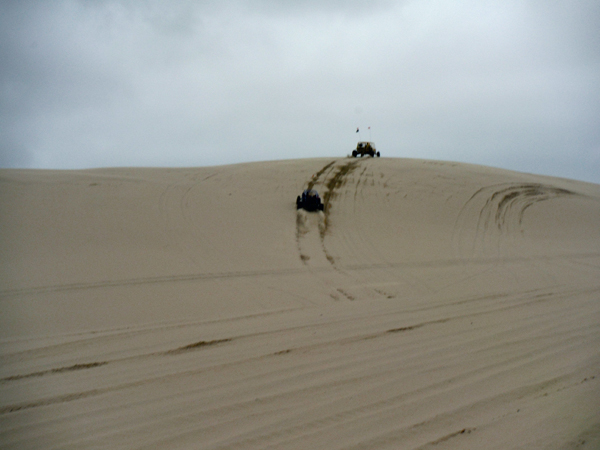 two dune buggies up the hill