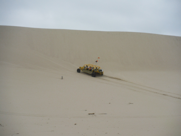 the yellow, bigger dune buggy