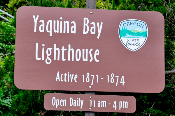 sign: Yaquina Bay Lighthouse