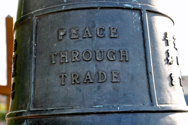 Peace through trade written on the bell