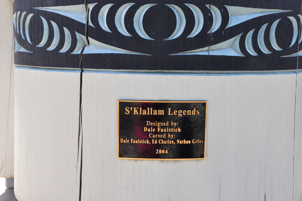 sign: S'Klallam Legends totem poles
