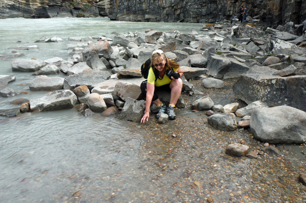 Karen touches the Athabasca River