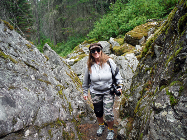 Karen Duquette makes her way between the big boulders