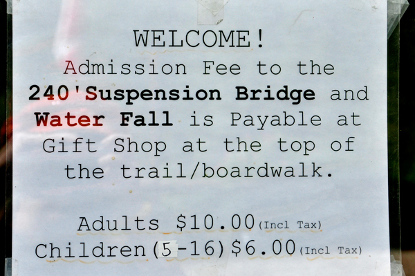 welcome and admission fee sign