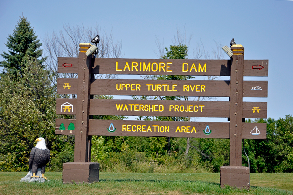 Larimore Dam sign