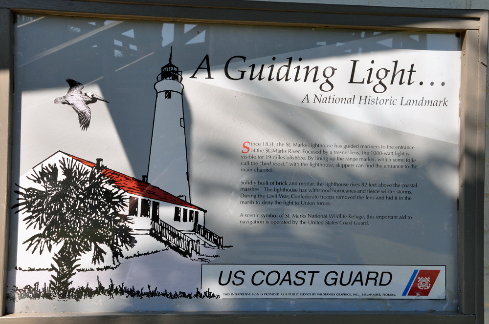 sign about the lighthouse light