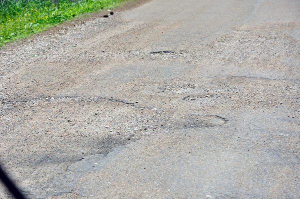 pot holes on the entry road to the campground