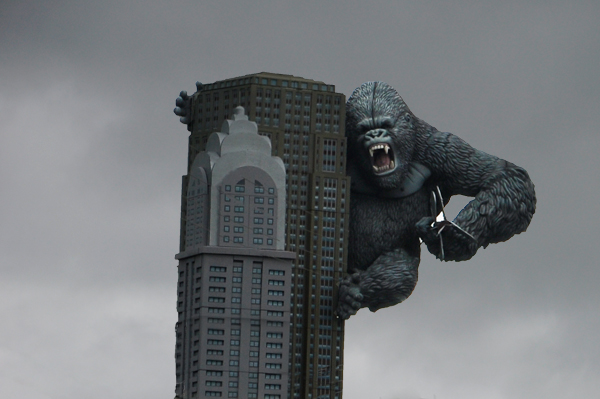 King Kong holding an airplane
