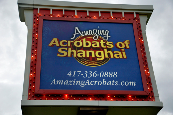Acrobats of Shanghai sign