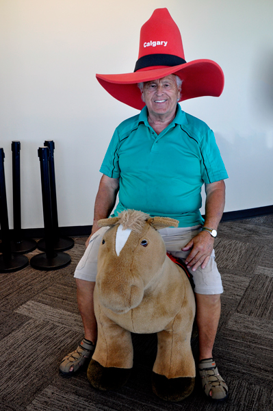 Lee Duquette on a pony inside the Calgary Tower