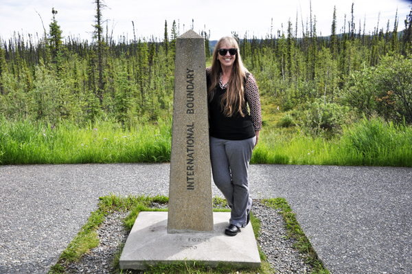 Karen Duquette at the International Boundary monument