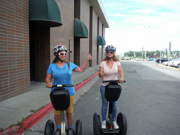 Karen Duquette and her sister Ilse on their Segway