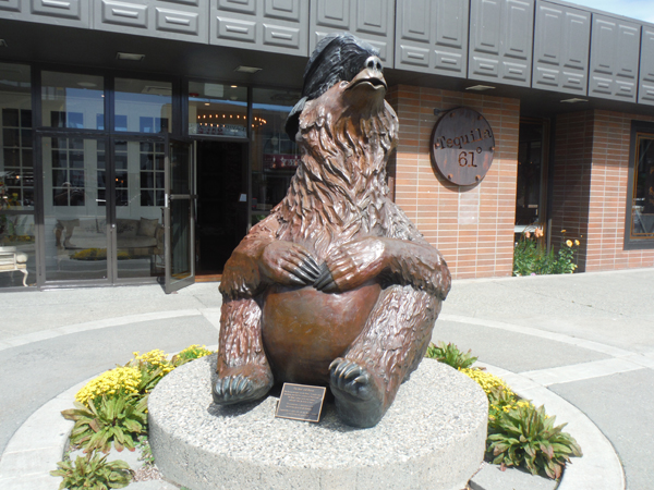 bear and raven statue