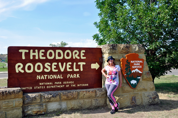 Karen Duquette at the Theodore Roosevelt National Park entrance