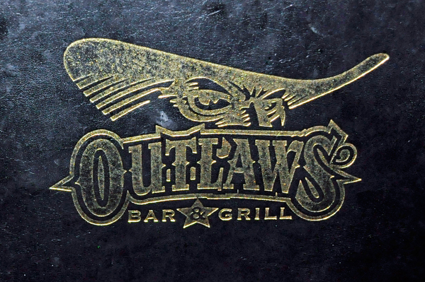 Outlaws Bar and Grill sign