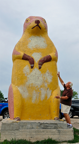 Lee Duquette and a big prairie dog statue