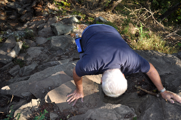 Lee Duquette decending the steep rocks