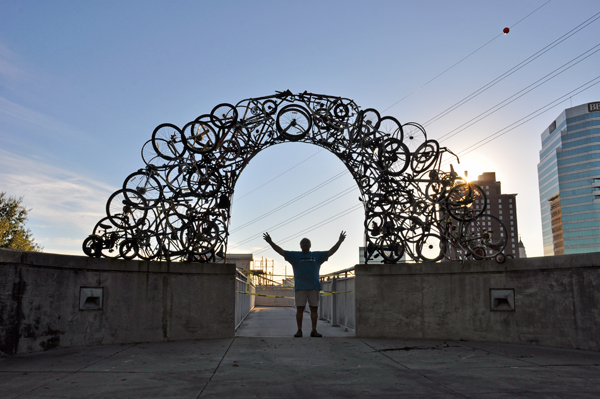 Lee Duquette and a bicycle arch