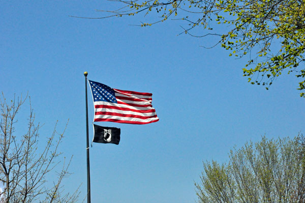 USA flag and POW flag
