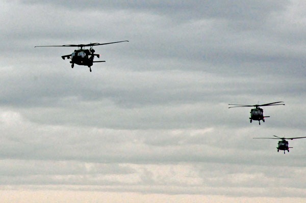 three helicopters