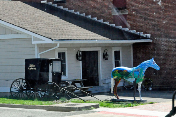 carriage and painted horse