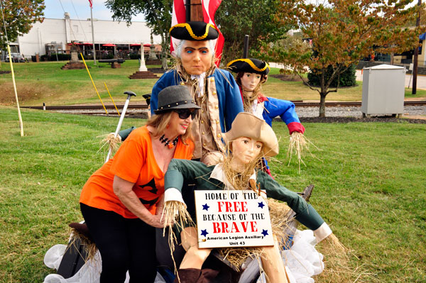Karen Duquette at the Home of the Free scarecrow