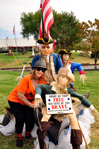 Karen Duquette at the Home of the Free scarecrows