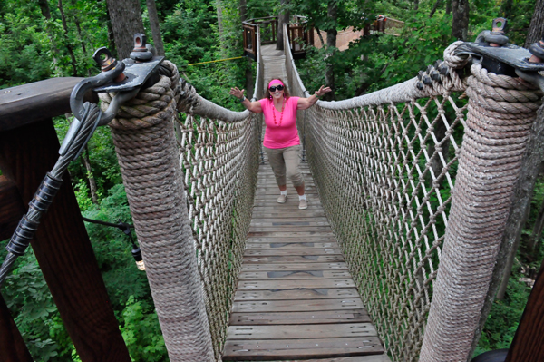 Karen Duquette on a swinging bridge