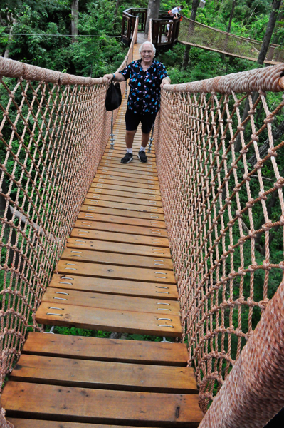 Lee Duquette on a swinging bridge