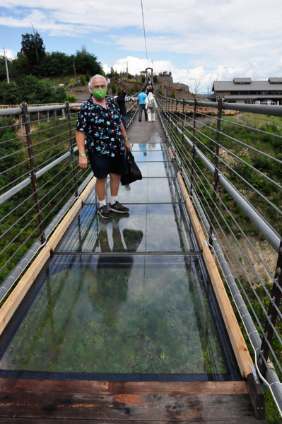 Lee Duquette's feet on the glass bottom skybridge