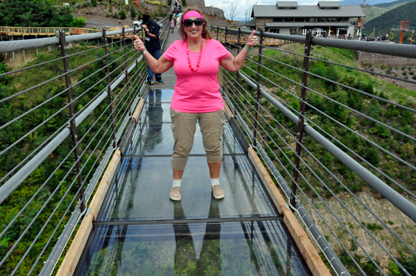 Karen Duquette on the glass bottom skybridge