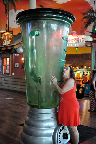 Karen Duquette licks a giant blender