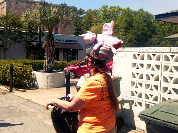 Karen Duquette in a pink pig helmet
