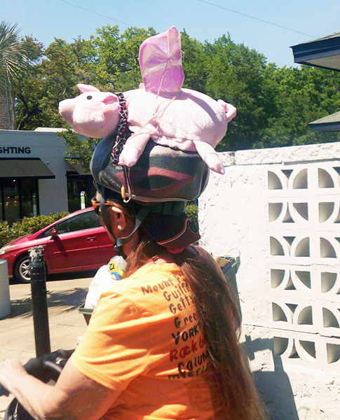 Karen Duquette in a pink pig helmet
