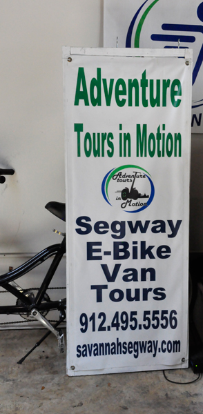 Adventure Tours in Motion sign