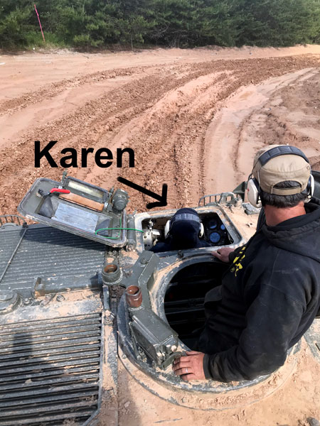 Karen Duquette driving the tank