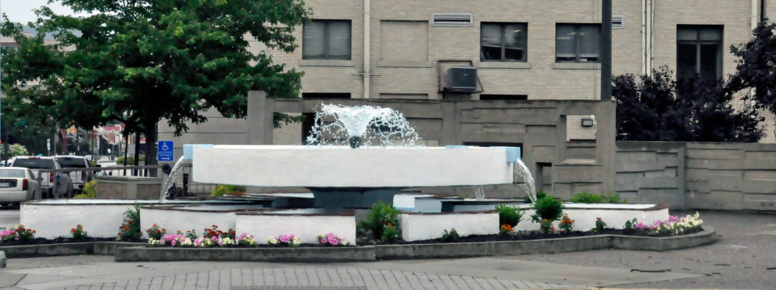 water fountain and flowers