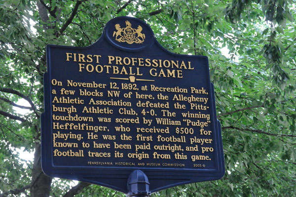 sign about the First Professional Football Game