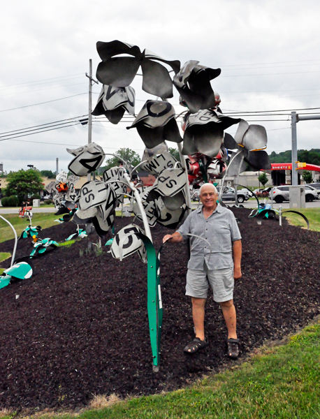 flower art made from road signs and Lee Duquette