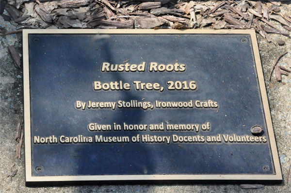 bottle tree Rusted Roots sign