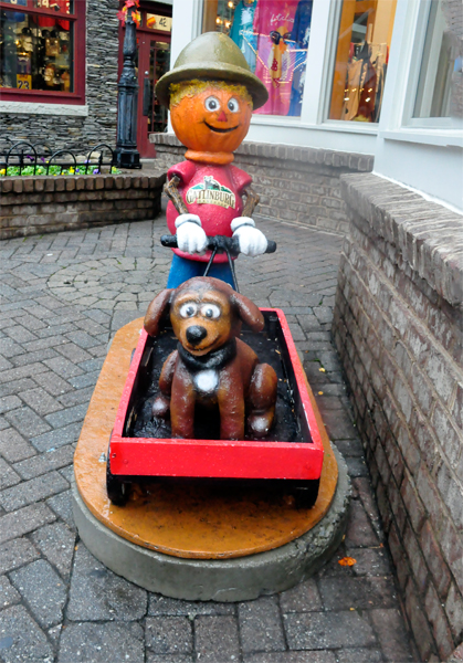 pumpkin man and dog sled