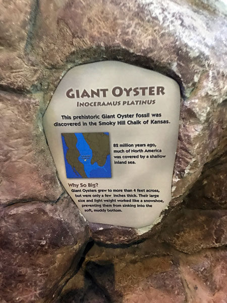 Giant Oyster sign in a rock