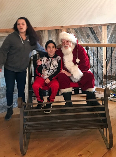 Mother and son with santa
