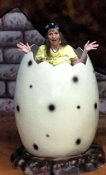 Karen Duquette in a Pteranodon egg