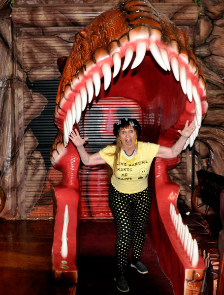 Karen Duquette in a dinosaur nouth
