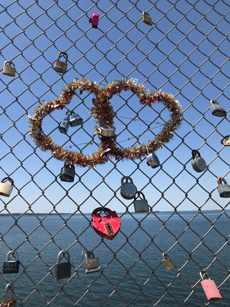 two joined hearts on the fence