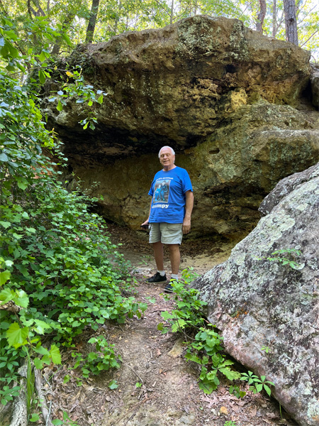 Lee Duquette in front of the small cave