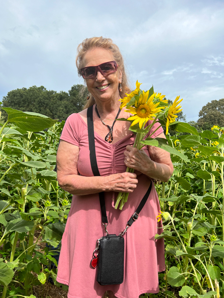 Karen Duquette and sunflowers