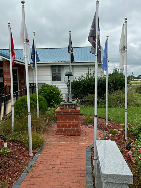 Honorable statue and flags